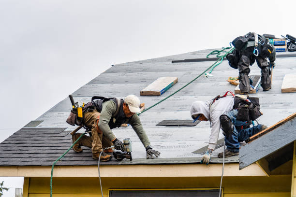 Professional Roofing technician working in Mystic, CT